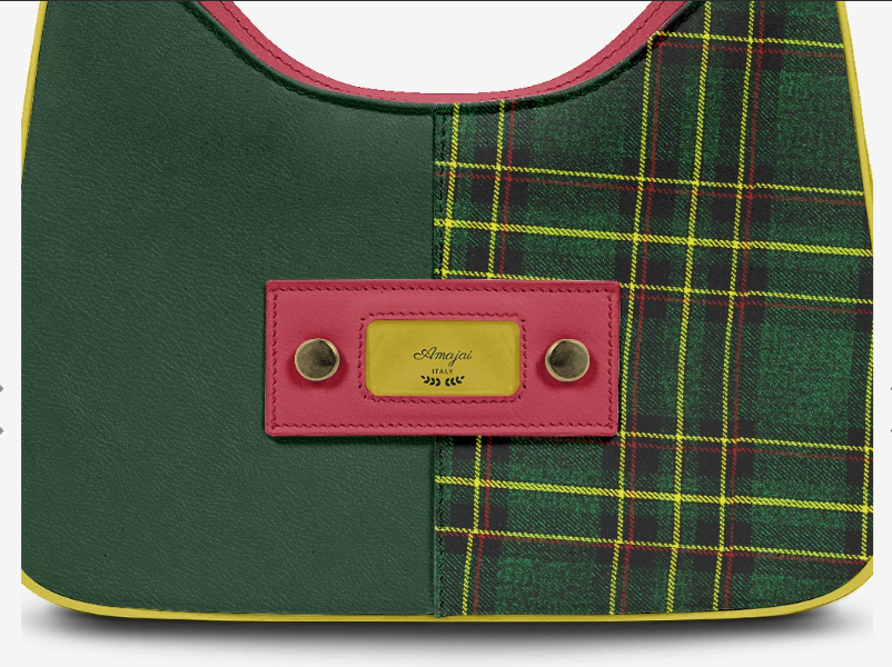 House Of Her-Mx plaque close-up - raspberry leather mount with brass studs and Amajai ITALY gold-tone nameplate